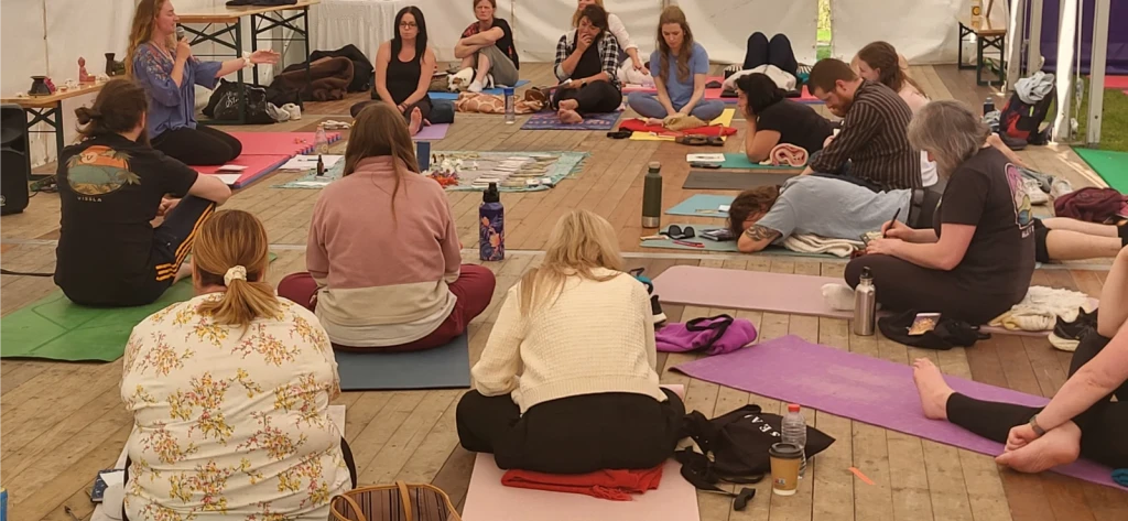 A group taking part in journaling and vision boarding