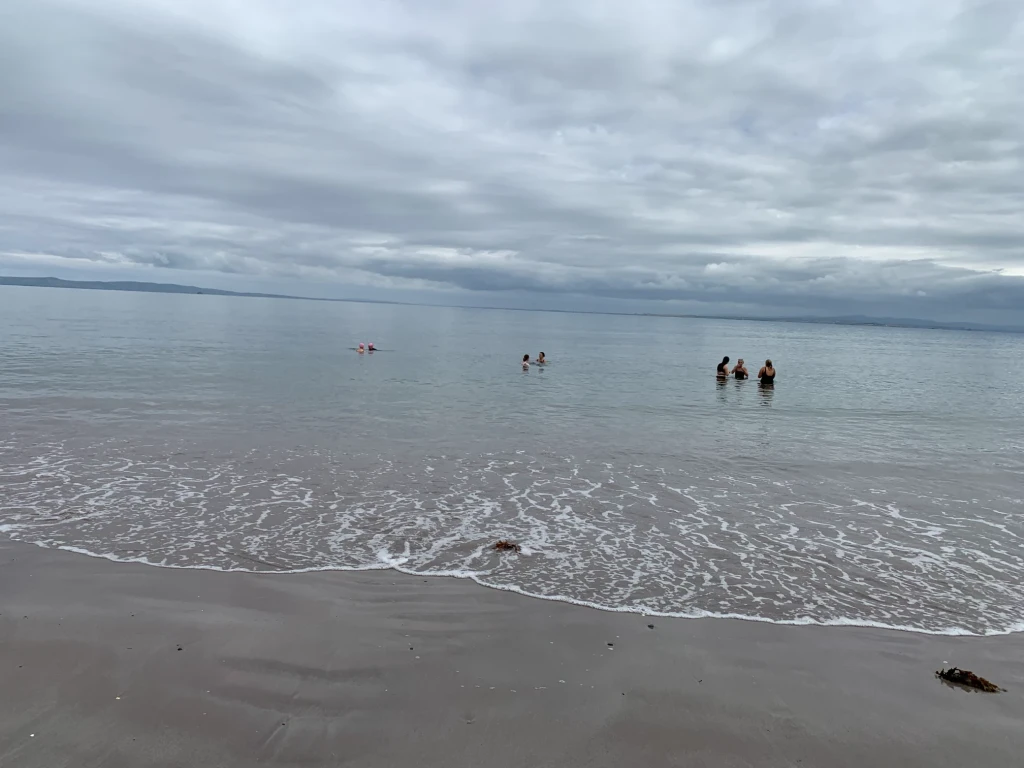 Taking a dip in the ocean at Castlegregory beach